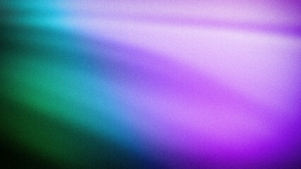 Vivid 4K gradient combining shades of purple, blue, and green with a grainy texture. Perfect for modern backdrops, banners, or wallpapers with a smooth, blurred effect