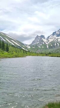 Courmayeur, Aosta Valley, Italy - Mont Blanc Massif. Combal lake and plateau, between Italy and France. In the background: Pyramides Calcaires.
