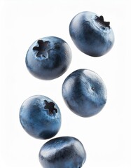 Obraz premium Trozos de queso azul cayendo, con un fondo blanco.