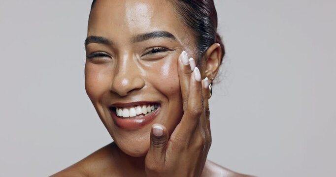 Woman, shine and face for skincare, application and cosmetics with facial, glow and transformation. Model, dermatology and hyaluronic acid in studio for skin, hydration and beauty on white background