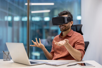 Business professional in modern office using virtual reality headset during video call. Engaged in...