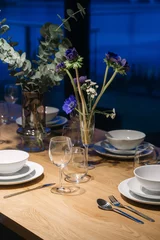 Fotobehang Eetkamer Table setting with flowers and white tableware  © brizmaker