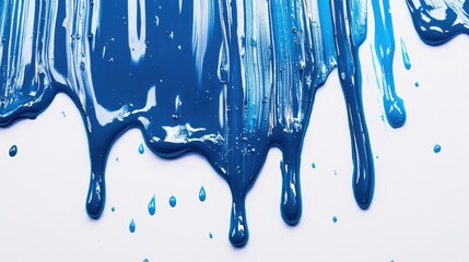 Naklejka premium Close-up of Dripping Blue Paint on White Background with Glossy Finish