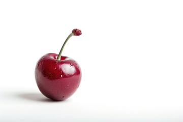 A single red apple with a stem sticking out