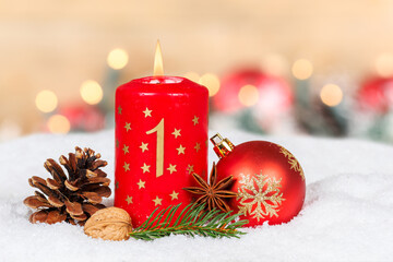 First 1st Sunday in advent with burning candle Christmas time decoration with copyspace copy space