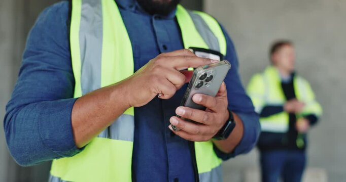 Phone, engineering and hands of construction worker on site for building development approval email. City planning, cellphone and industrial civil contractor typing email for renovation or building.