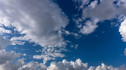 cumulus clouds in blue sky