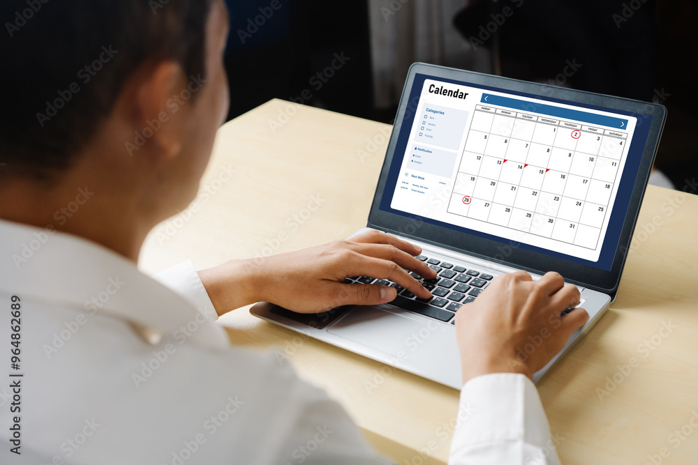 Poster calendar on computer software application for modish schedule planning for personal organizer and on