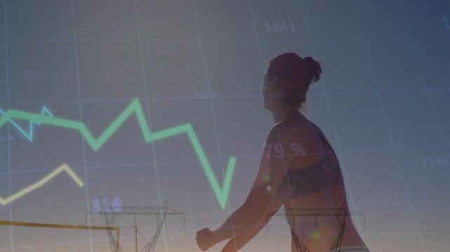 Animation of financial data processing over caucasian woman playing beach netball