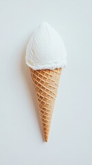 Waffle cone with vanilla ice cream on white background