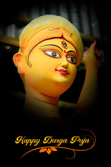 Idol of Goddess Devi Durga at a decorated puja pandal in Kolkata, West Bengal, India. Durga Puja is...