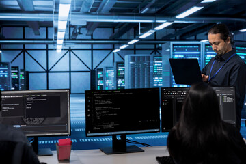 Admin doing yearly checkup to prolong data center electronics life span and avoid downtime....