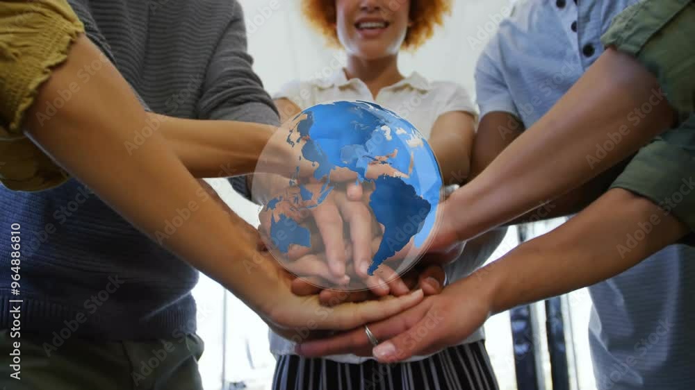 Wall mural Animation of globe over diverse business people stacking hands