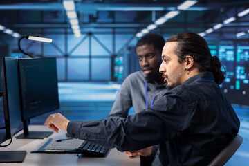Engineers doing maintenance in server hub to extend equipment life span and avoid downtime....