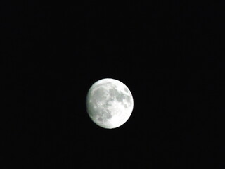 Waxing gibbous moon over sky