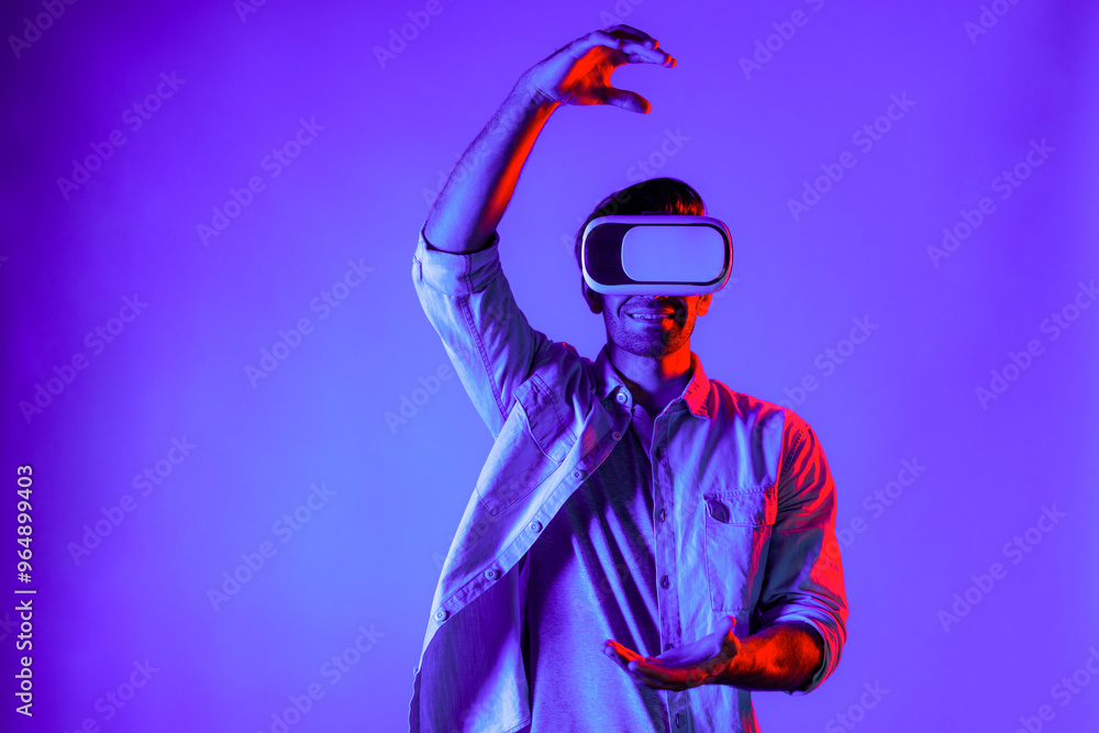 Poster caucasian smart man holding and moving gesture while using vr goggle. happy person using headset and