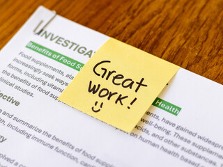 Fototapeta premium Great work concept written in a sticky note. Employee motivation