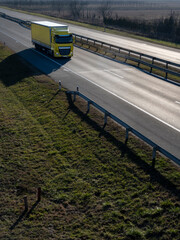 Yellow truck on the highway