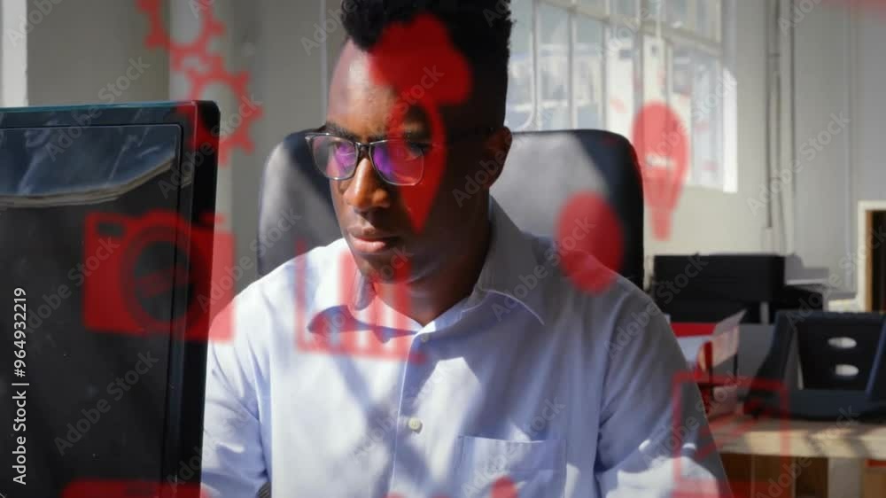 Poster animation of media icons over biracial businessman using computer in office