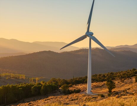Windmill at side of mountain during a spring day.