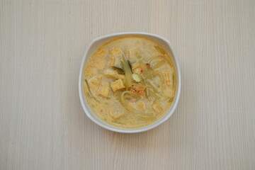 Sayur Labu Siam or Manisa or Jipang or Chayote, Indonesian food, made from slice of chayote cooked with spicy coconut milk. Sayur Godog Labu Siem served in a bowl.