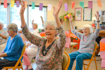 Cheerful seniors engaging in a lively social activity