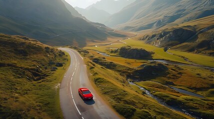 Scenic aerial view of car on the mountain road in Switzerland in Summertime.
