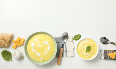 Cheese soup in a bowl on a white background