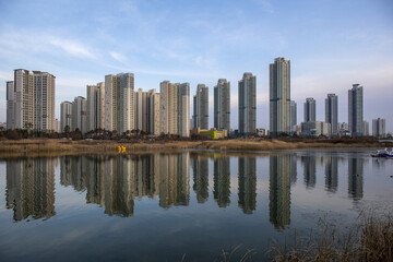 Seo-gu, Incheon, South Korea - January 3, 2021: Highrise apartments and Cheongna Lake Park at Cheongna International City