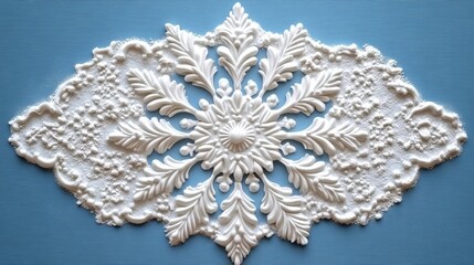 Obraz premium Holiday-themed cookie cutter, shaped like a snowflake, lying on a floured surface, kitchen lighting