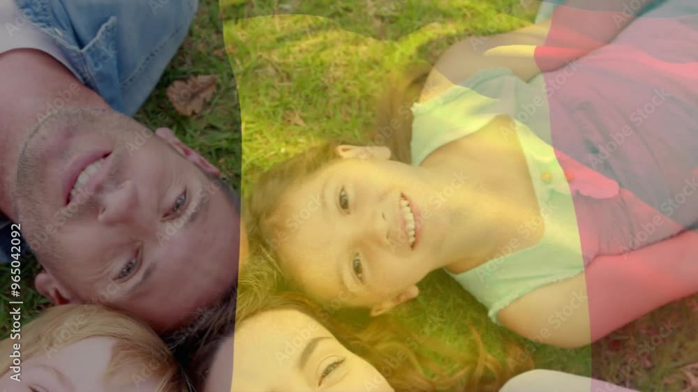 Poster Animation of flag of france over caucasian family lying on grass