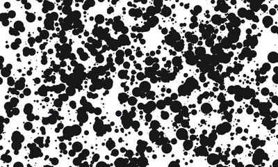 Black dots splatter on white background
