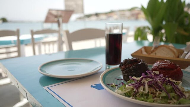 View of stuffed peppers at restaurant in Plaza de l' Ascension in Gaios Town, Paxos, Ionian Sea, Greek Islands, Greece, Europe