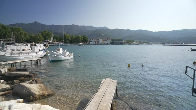 View of harbour and hills in background, Thassos Town (Limenas), Thassos, Aegean Sea, Greek Islands, Greece, Europe