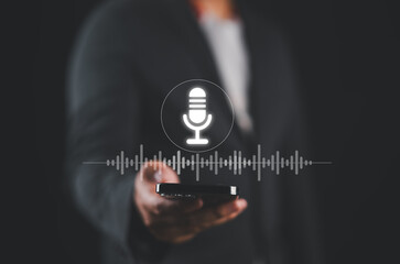 Businessman voice recording the conversation via smartphone with customers, telemarketing, consulting, voice assistance access to information and applications, write a message and send a message.