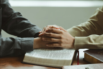 holding hands of people with trust for mental health support, empathy and prayer worship for hope....
