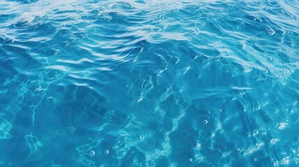 Obraz premium A serene and tranquil scene of the ocean surface, with gentle ripples and shimmering sunlight reflecting off the water.