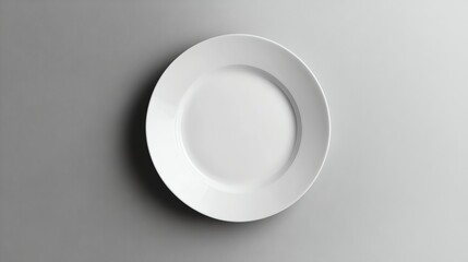 A white plate on a white background.