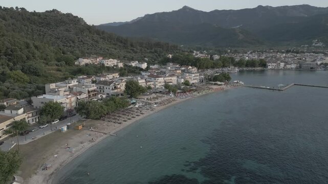 Drone view of Thassos Town (Limenas) and Aegean Sea at sunset, Thassos Town (Limenas), Thassos, Aegean Sea, Greek Islands, Greece, Europe