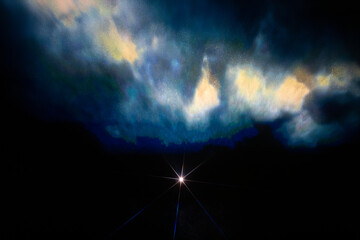 A dynamic scene of silhouetted horses running against a backdrop of colorful, glowing clouds, with a brilliant starburst light at the center. The image evokes a sense of freedom and fantasy.