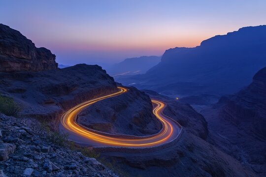 Western Saudi Arabia s treacherous Al Hada road passes through the Al Hada Mountains near Taif with illuminated headlight trails at night