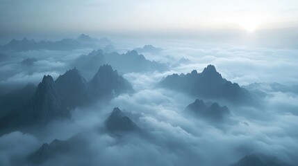 Misty mountain landscape with clouds and fog, showcasing a serene view of snow-capped peaks and lush forests