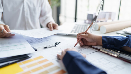 Architecture drawing on architectural project business architecture building construction Colleagues designer Planning Design on blueprint and compasses