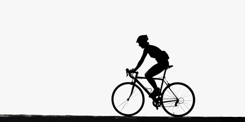 Obraz premium Dark silhouette of a cyclist pedaling against a stark white background during a leisurely ride