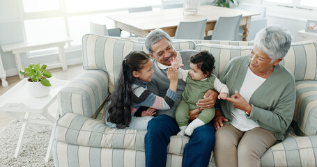 Grandparents, relax and grandchildren on sofa for high five, bonding and family support in living...