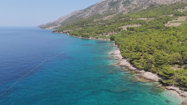Aerial View of the Paklina Fkk⁩⁦ Beach in Bol on Brac Island, Split Dalmatia, in Croatia. Summer Vacation Resort Near Golden Cape or Golden Horn Zlatni Rat Beach. Famous Adriatic Beach on Adriatic Sea