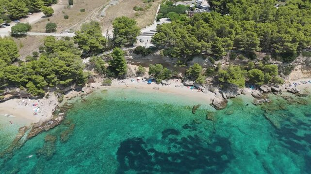 Aerial View of the Paklina Fkk⁩⁦ Beach in Bol on Brac Island, Split Dalmatia, in Croatia. Summer Vacation Resort Near Golden Cape or Golden Horn Zlatni Rat Beach. Famous Adriatic Beach on Adriatic Sea