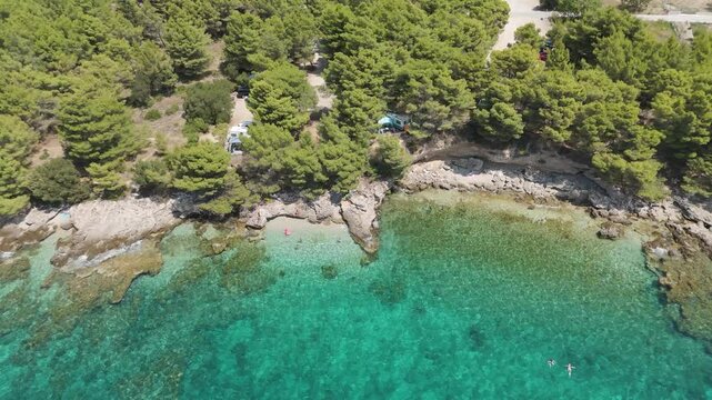 Aerial View of the Paklina Fkk⁩⁦ Beach in Bol on Brac Island, Split Dalmatia, in Croatia. Summer Vacation Resort Near Golden Cape or Golden Horn Zlatni Rat Beach. Famous Adriatic Beach on Adriatic Sea