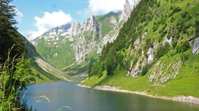 Static shot of F&auml;lensee (or F&auml;hlensee), a serene lake nestled in a narrow valley between Hundsteingrat and Roslen-Saxer First in the Alpstein range of the canton of Appenzell Innerrhoden, Switzerland.