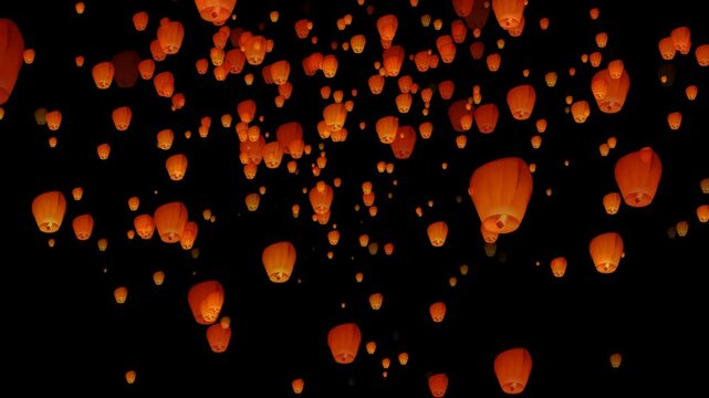 Many sky lanterns float into the sky.